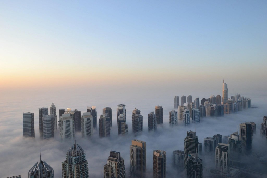 http://www.mostbeautifulplacesintheworld.org/wp-content/uploads/2013/07/dubai-morning-fog-cool-skyscrapers-height-city.jpg